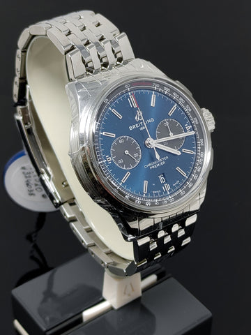 The Breitling Premier B01 Chronograph Automatic 42mm Watch features a blue dial with contrasting chronograph counters, encased in stainless steel, powered by the Manufacture Breitling Caliber 01.