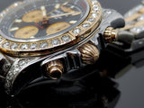 Breitling Chronomat 41 CB0140 adorned with 8.90 ct diamonds, showcasing its two-tone rose gold and stainless steel bracelet, luminous black dial, and detailed craftsmanship.