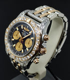 Breitling Chronomat 41 CB0140 adorned with 8.90 ct diamonds, showcasing its two-tone rose gold and stainless steel bracelet, luminous black dial, and detailed craftsmanship.